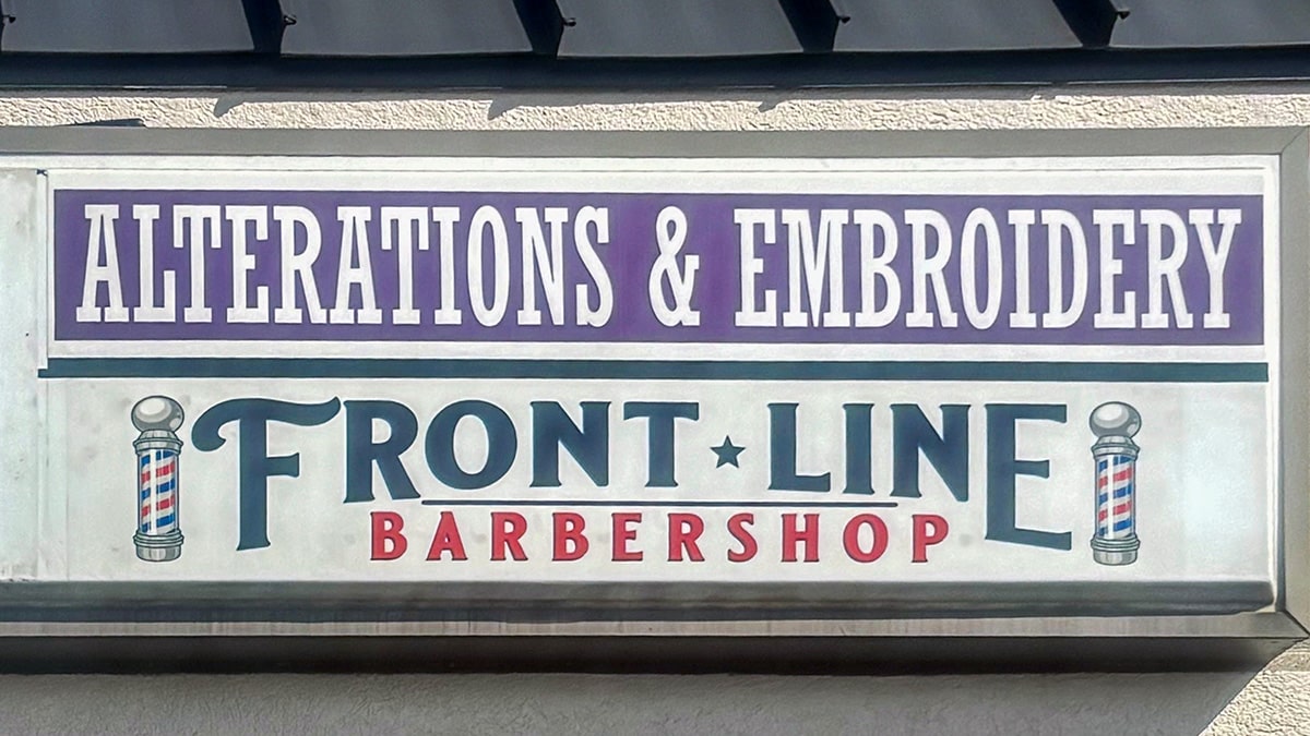 front line barbershop outdoor sign min